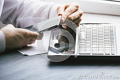 Business man drinking coffee and using laptop computer and mobil Stock Photo