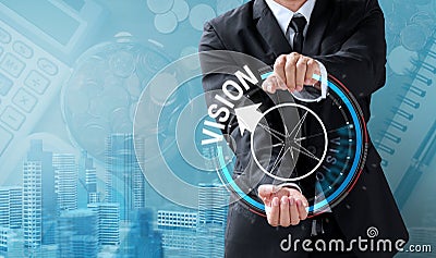 Business man drive compass for vision Stock Photo