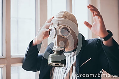 Business man with gas mask 2.5 pm problem pollution, business environment dangerous concept Stock Photo