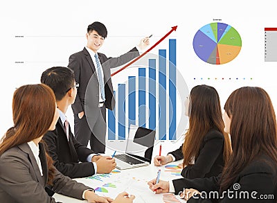 Business man giving a presentation about marketing sales Stock Photo