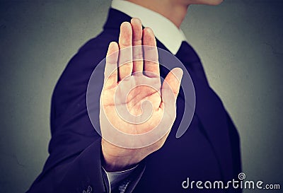 Business man giving stop hand gesture Stock Photo