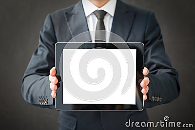 Business man holding blank screen tablet Stock Photo