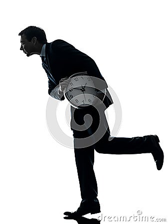 Business man holding clock robbing time silhouette Stock Photo