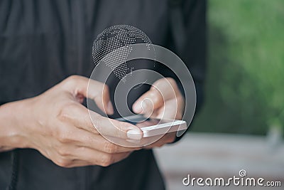 Business man holding global network international business network internet technology over on smartphone Stock Photo