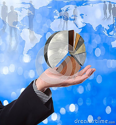 Business man holding pie graph Stock Photo