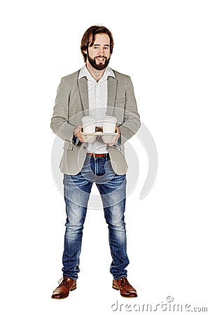 Business man holding a take out tray of disposable coffee cups. Stock Photo