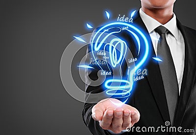 Business man with idea light bulb Stock Photo