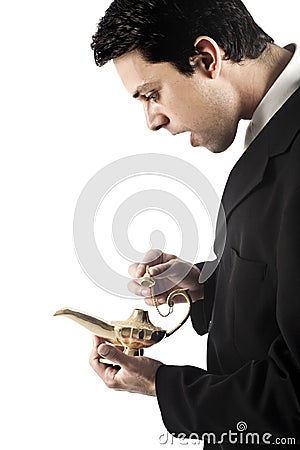 Business Man with Magic Lamp Stock Photo