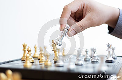 Business men make plans to play chess with Prudence and success Stock Photo