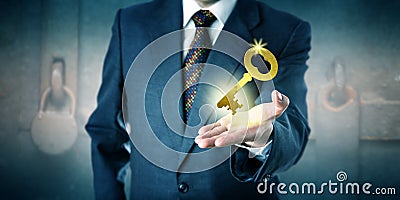 Business Man Offering A Golden Key In Open Palm Stock Photo