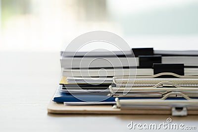 Business man Office employee working contract with documents Stacks of Files paper and law Stock Photo