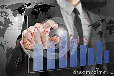 Business man pointing at interactive business graph Stock Photo