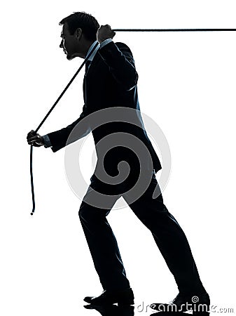 Business man pulling a rope silhouette Stock Photo