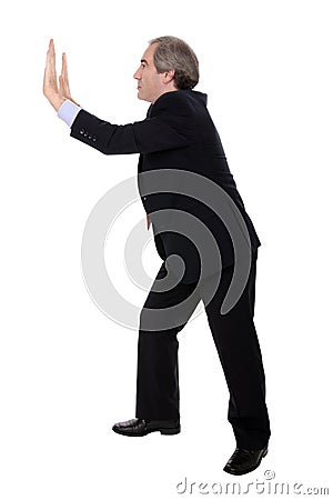 Business man pushing something Stock Photo