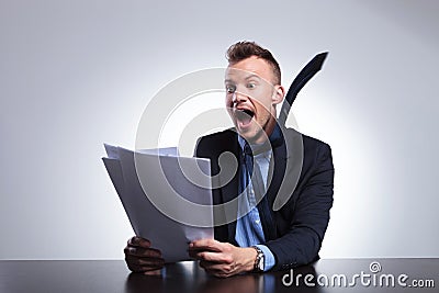 Business man reads breaking news Stock Photo