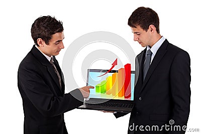 Business man show on laptop with chart 2 Stock Photo