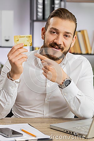Business man show plastic credit bank card advertising transferring money cashless, purchases online Stock Photo
