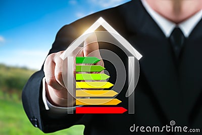Business man showing an energetic house. Saving energy and environment concept Stock Photo