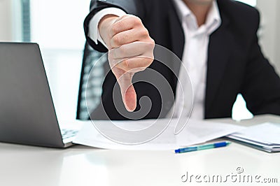 Business man showing thumbs down. Stock Photo
