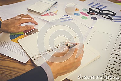 Business man signing a contract. Owns the business sign personally, director of the company, solicitor. Real estate agent holding Stock Photo