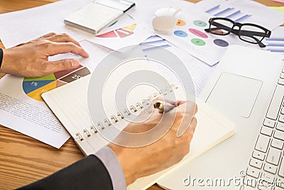 Business man signing a contract. Owns the business sign personally, director of the company, solicitor. Real estate agent holding Stock Photo