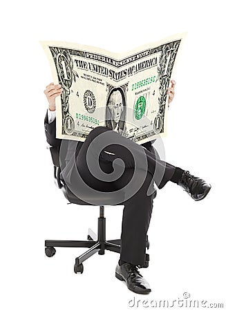Business man sitting on a chair with American currency Stock Photo