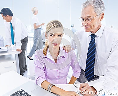 Business Man Subtly Sexual Harrasing The Business Woman Stock Photo