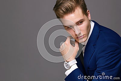 Business man in suit with clock Stock Photo