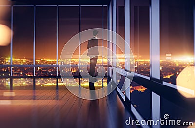 Business man in suit looking at the night city. 3d Stock Photo