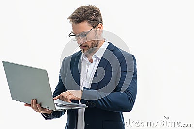 Business man in suit using laptop. Male businessman worker watch video on computer laptop. Serious man hold laptop Stock Photo