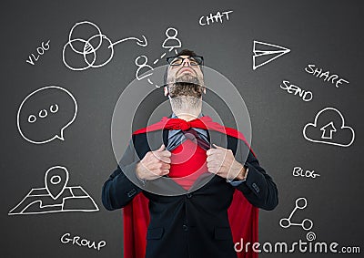 Business man superhero opening shirt against grey wall with white business doodles Stock Photo