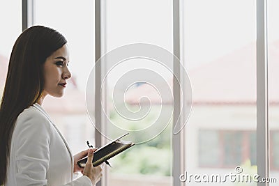 Business man taking note in office . for woman confidence concept Stock Photo