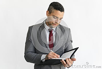 Business man taking notes isolated on white background Stock Photo