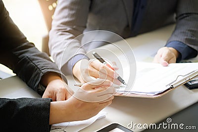 business man talking to consult report paper of financial. Stock Photo