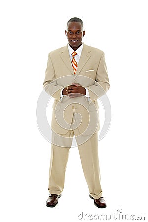 Business Man in Tan Suit Stock Photo