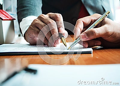 Business man with tax calculation for house tax and car loan. Stock Photo