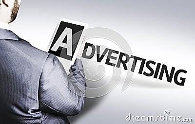 Business man with the text Advertising in a concept image Stock Photo