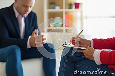 Man at therapy session Stock Photo