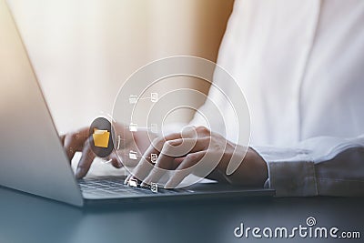 business man typing on a keyboard with holograms of digital document files, data files on computers stored as cloud databases can Stock Photo