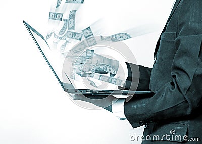 business man using a laptop building online business making money dollar bills Stock Photo