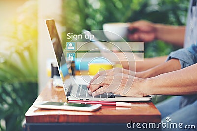 Business man using laptop computer and sign up or log in username password in coffee shop,GDPR.cyber security and privacy concept Stock Photo