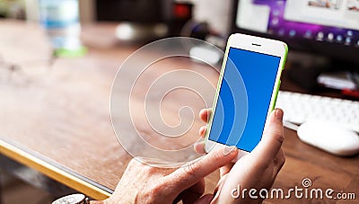 Business Man using Mobile Phone in Office Stock Photo