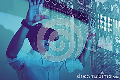 Business man using VR technology display visual business hologram information Stock Photo