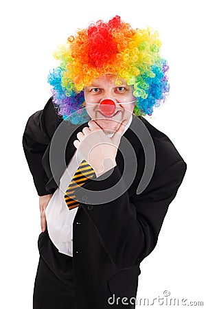 Business man wearing colorful clown wig Stock Photo