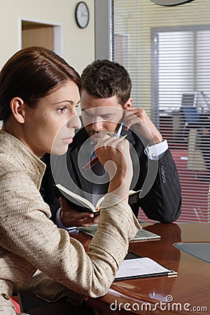 Business man and woman talking in the office Stock Photo