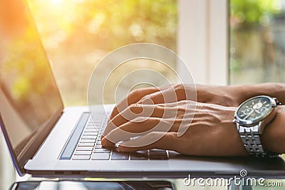 Business man working on laptop, Close up of hands of business man, Business concept Stock Photo