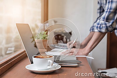 Business man working at office with documents and laptop Stock Photo