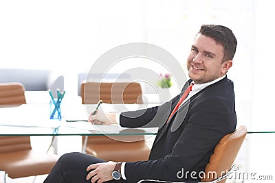 Business man working at office with laptop and documents on his desk Stock Photo