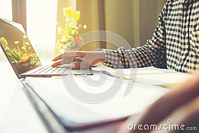 Business man working sitting at desktop computer at his desk in modern bright startup office Stock Photo