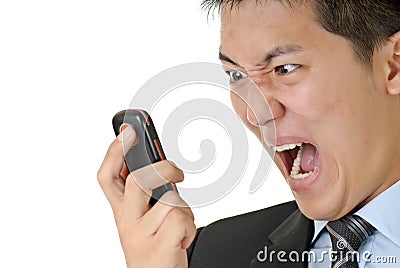 Business man yell to phone Stock Photo